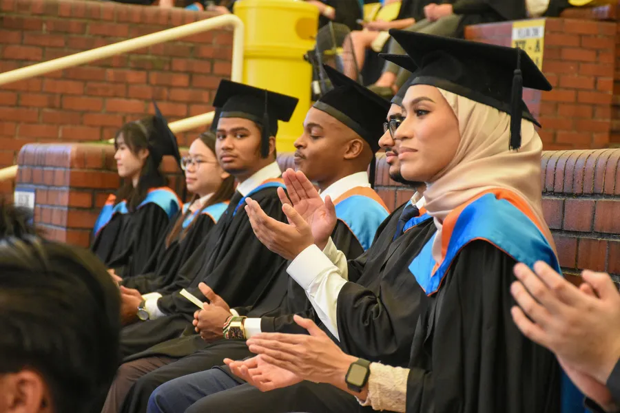 Students at graduation ceremony 